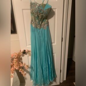 Elegant Blue Gown with Silver Embellishments and Side Slit